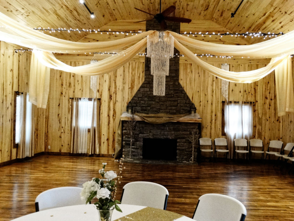 great room fireplace wedding lakeside cedar lodge